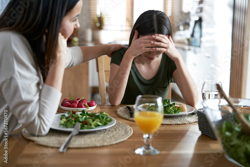 Caucasian woman support her daughter with eating disorders