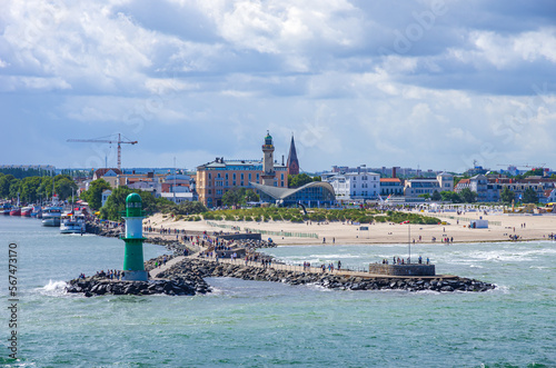 Maritime atmosphere around the West breakwater along with the picturesque backdrop of Rostock-Warnemunde, Mecklenburg-Western Pomerania, Germany, Europe.