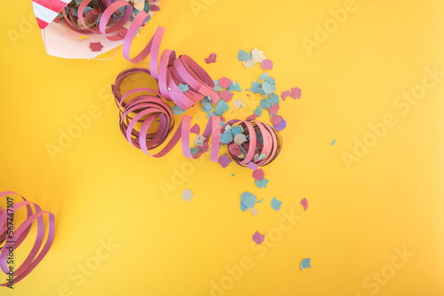 Symbolic image alluding to Carnival using streamers and confetti transmitting a lot of color typical of the festive season. Copy space.