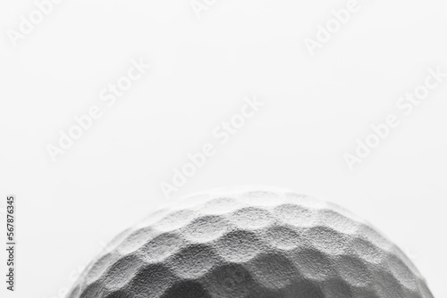 Close up of white golf ball with copy space on white background