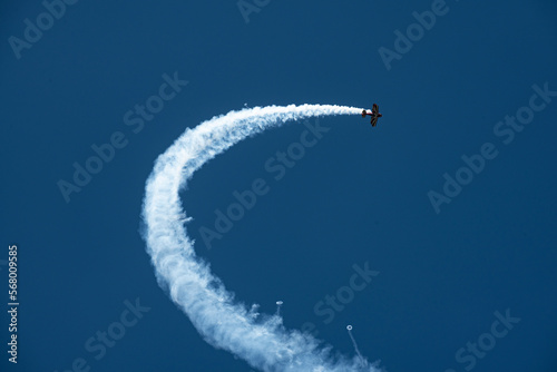 A biplane flies in the airshow