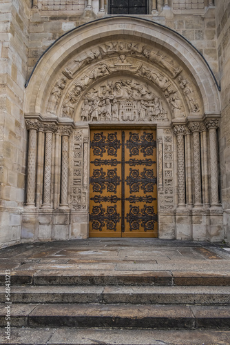 Fragments of the facade of Basilica of Saint-Denis (Basilique royale de Saint-Denis, from 1144) - former medieval abbey church in city of Saint-Denis, a northern suburb of Paris. France.