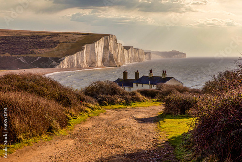 The Seven Sisters are a series of chalk sea cliffs on the English Channel coast, and are a stretch of the sea-eroded section of the South Downs range of hills, in the county of East Sussex