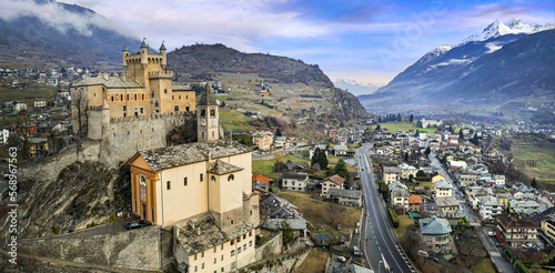 Italy, Valle d'Aosta region famous with medieval historic castles. Scenic Saint-Pierre town and beatiful castle aerial drone view