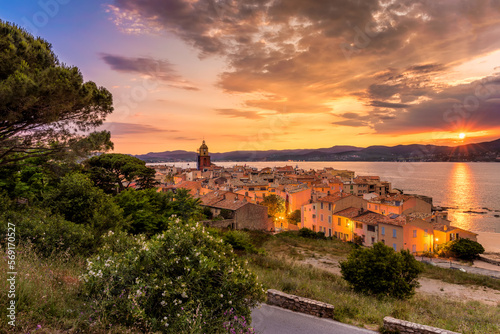 Scenic view of Saint Tropez in summer sunset light and city lights turned on