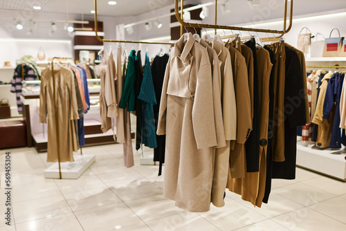 Wide angle background image of Autumn fashion collection on racks
