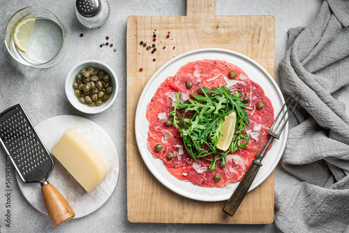 Beef carpaccio with capers, arugula and parmesan