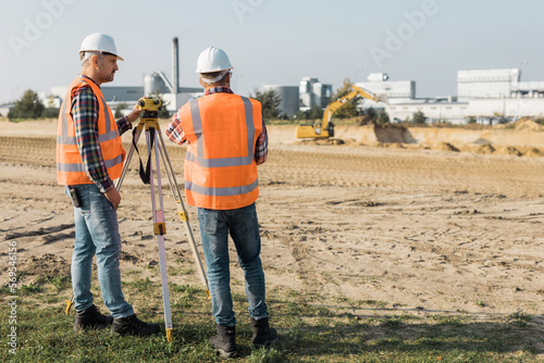 Men supervising the project