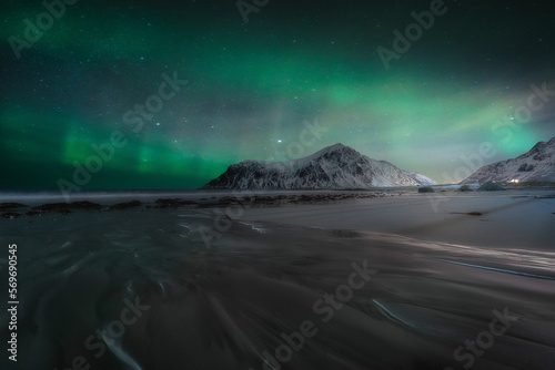 Aurora in winter by the sea in Lofoten Islands, Norway