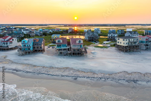 Aerial View of Beach Homes Right on the Shoreline and Marshland in North Topsail Beach at Sunset