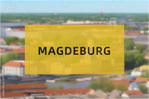 Magdeburg: Der Name der deutschen Stadt Magdeburg im Bundesland Sachsen-Anhalt vor einem Hintergrundbild