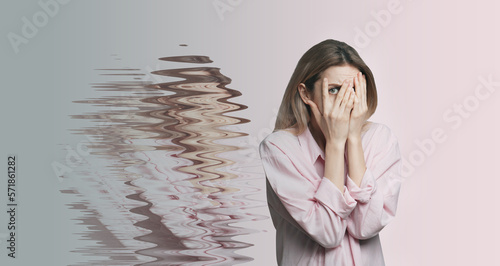 Scared woman having hallucination on light background. Distorted image