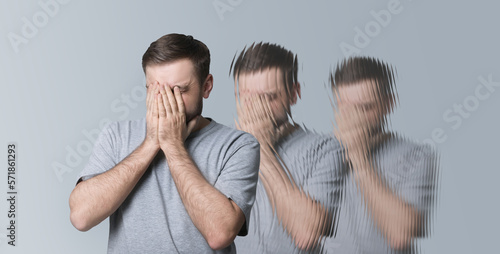 Scared man having hallucination on light grey background. Distorted image