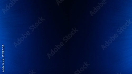 Fondo abstracto con detalle, patron geometrico y degradado de luz y sombra sobre color azul oscuro y negro