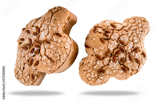 Colomba Pasquale cake, traditional Italian Easter dove with glazed sugar and almonds on top. two cakes cut out