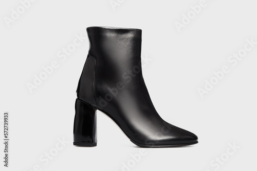 Black women's fashion leather high heel ankle boot isolated on white background. Female classic spring autumn shoe. Blank casual classic footwear. Mock up, template