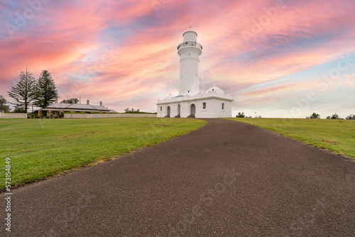 Macquarie Lighthouse at Lighthouse Reserve and Christison Park in Vaucluse, East Sydney, NSW Australia on a red sky background 