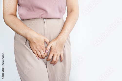 vaginal yeast infection concept woman suffering from itching and irritation in the vagina and vulva