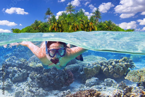Women at snorkeling in the tropical water