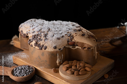 Colomba with chocolate. Easter Italian cake with almonds and chocolate in the shape of a dove. Festive pastries are traditional in Italy. 