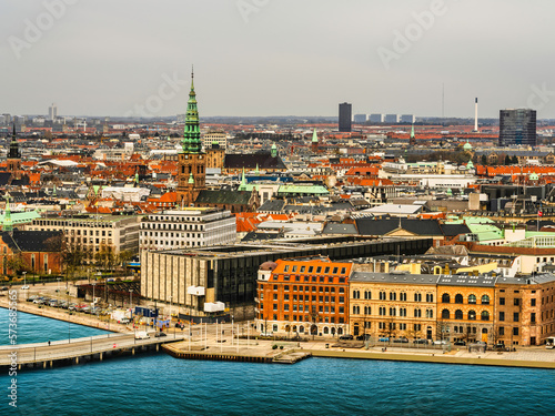 Aerial shot of downtown Copenhagen's historic buildings and Christiansborg Palace tower, Denmark