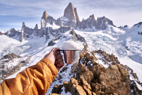 cup full of snow on top of cerro madsen, patagonia argentina