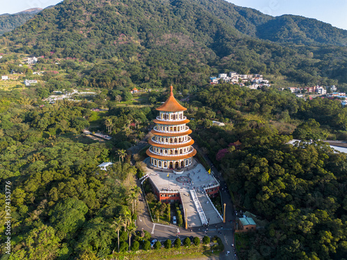 Aerial drone photo of Wuji Tianyuan Temple in Tamsui, New Taipei City, Taiwan with beautiful blue sky.
