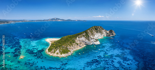 Aerial panorama of the beautiful island of Marathonisi or Turtle island in the bay of Laganas with turquoise sea and sand beaches, Zakynthos, Greece