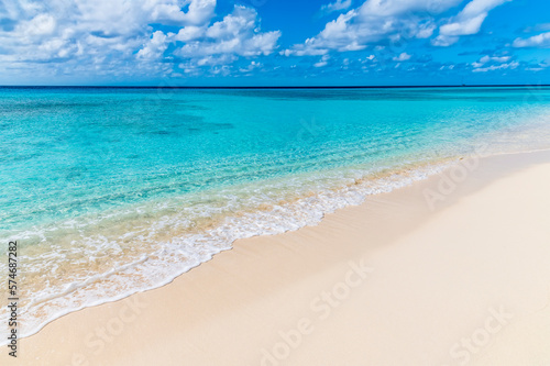 A view out to sea along the shoreline on the island of Grand Turk on a bright sunny morning