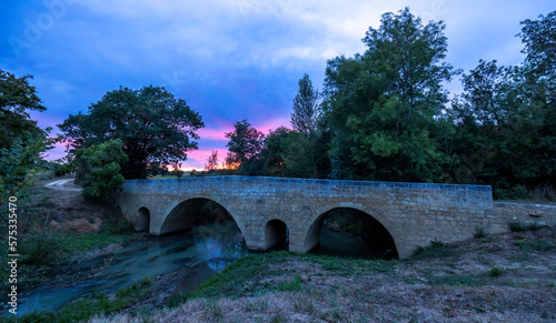 Romanesque bridge of Artigue and river Osse near Larressingle on route to Santiago de Compostela, UNESCO World Heritage Site, departement Gers, France