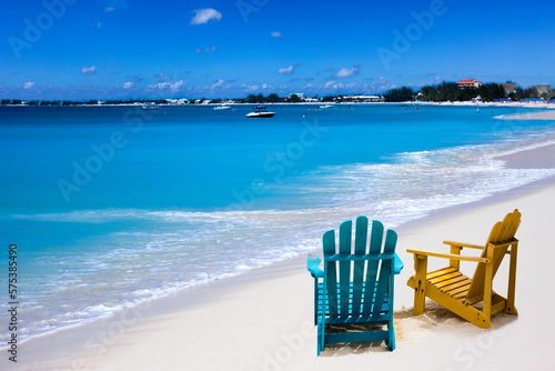 Two lounge chairs on Caribbean beach