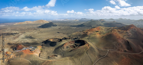  The drone panoramic view of volcanoes in the Timanfaya natural park, Lanzarote, Spain. Timanfaya National Park in the southwestern part of the island of Lanzarote, in the Canary Islands.