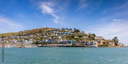 A panoramic view of Kingswear and its colourful buildings from across the River Dart in Dartmouth, Devon.