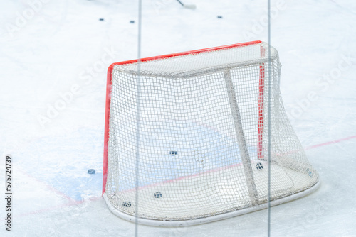 ice hockey goal with pucks, during a hockey players training session