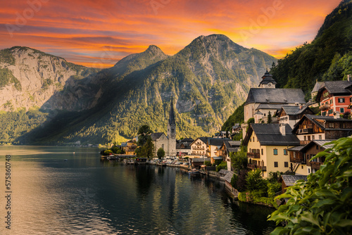 Hallstatt town with reflection in lake with sunset sky, Austria