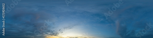 Dramatic sunset sky panorama with Cumulus clouds. Seamless hdr 360 pano in spherical equirectangular format. Complete zenith for 3D visualization, game and sky replacement for aerial drone panoramas