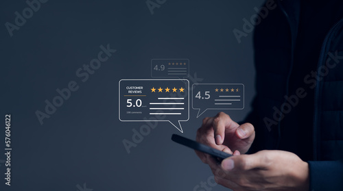 User give rating to service excellent experience on mobile phone application, Client evaluate quality of service reputation ranking of business. Customer review satisfaction feedback survey concept.