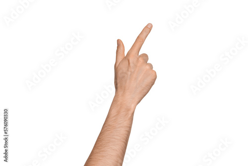 A man's hand points the direction with his finger. Points diagonally to the side. Index finger pressing something. Isolate on a white background.