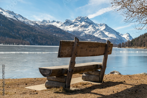 Empty bench at the lake of Silvaplana in Switzerland