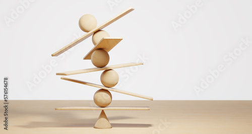 Wooden spheres balancing on seesaw. Concept of harmony and balance in life and work