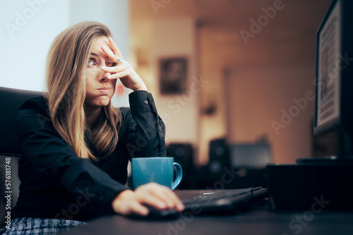 Woman Covering Her Eyes while Browsing the Internet. Content moderator feeling terrified of what she sees 