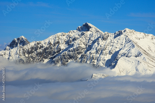 Scenic view of the Bergamasque Prealps. In the photo the recognizable peaks are: Mount Corna Piana (left), Pizzo Arera (the highest ) and Cima di Menna (right). Bergamo Alps, Italy