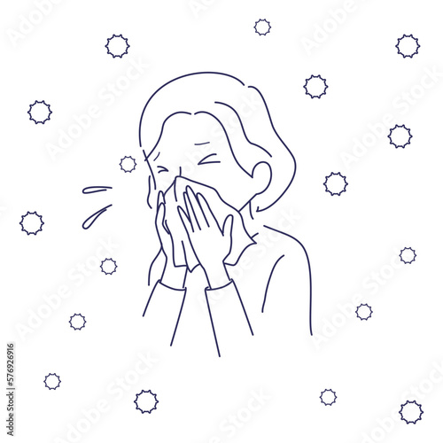 花粉症で鼻をかむ女性と花粉