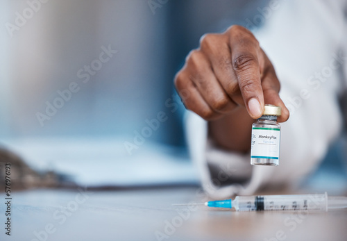 Monkeypox vaccine, medicine and doctor hands with bottle mockup, healthcare or booster vial for disease protection. Medical hospital clinic, pharmacy pharmacist or black woman with virus immunization