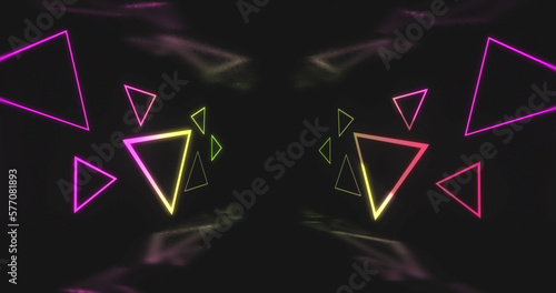 Image of pink and yellow neon light triangles flickering on black background