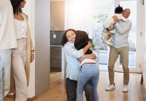 Hug, happy and family in a house for a visit, excited and showing affection. Smile, affectionate and grandparents hugging children, bonding and reunited while visiting during retirement together