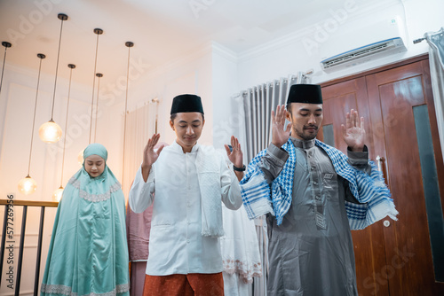 leading man as imam during congregational prayer in the prayer room