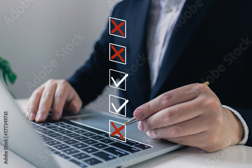 Businessman tick mark to rejected and approve document checklist.check problem solution management with QA and QC, filling out the online survey form, Answer test questions, Take an assessment