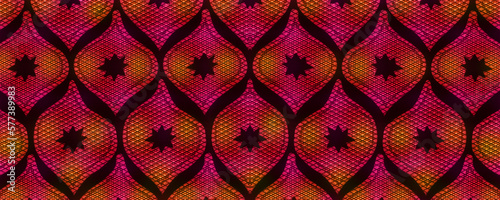 Colorful African fabric, seamless and textured pattern, red pink and black colors, photo
