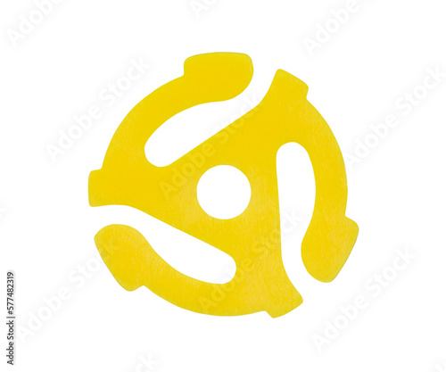 Yellow plastic adapter for playing 45 r.p.m. vinyl singles on 33 r.p.m. record players with cut out background.